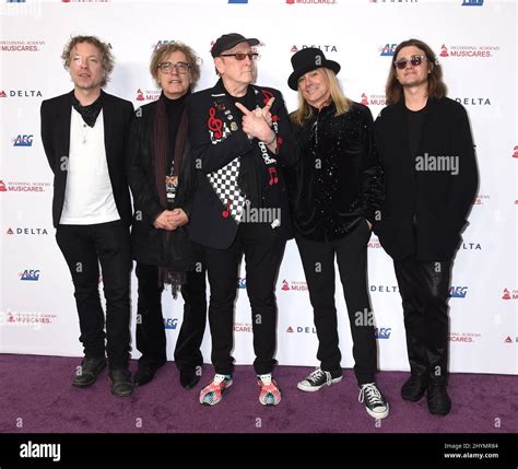 Daxx Nielsen, Tom Petersson, Rick Nielsen, Robin Zander, and Robin ...
