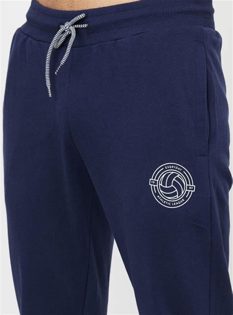 Buy Men Textured Slim Fit Track Pants Online at just Rs. 599.0 ...