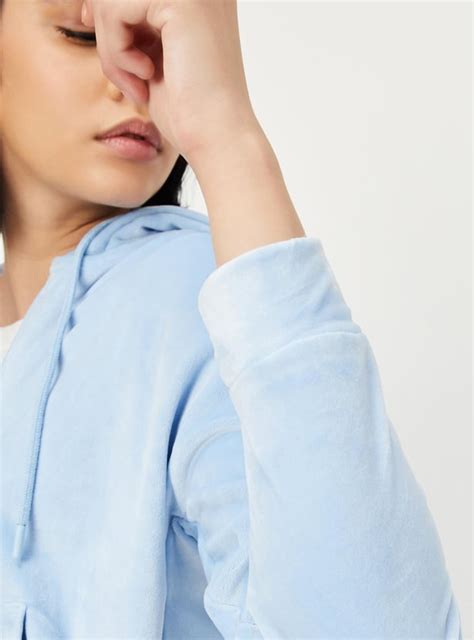 Buy Women Solid Hooded Sweatshirt Online at just Rs. 999.0 ...