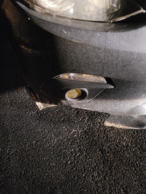 Pothole in an unpaved parking lot. This is why I don't want to lower my ...