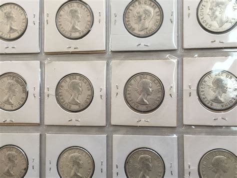 PAGE LOT CANADA SILVER 50 CENT PIECES VARIOUS YEARS BETWEEN - Schmalz ...