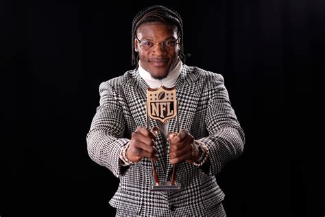 Lamar Jackson collects second NFL MVP award | The Independent