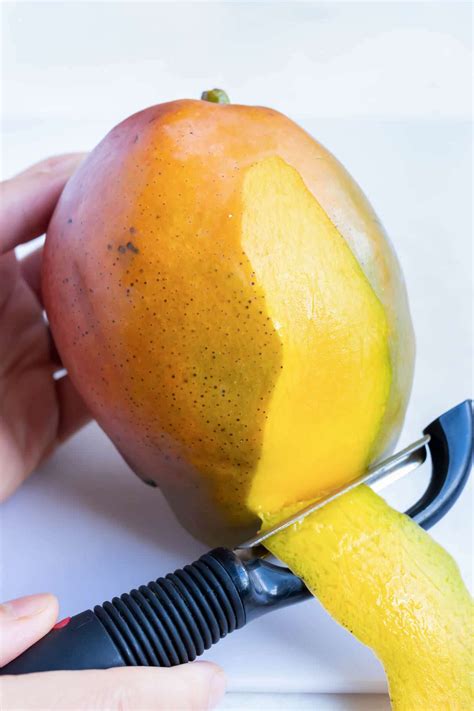 How to Cut a Mango (with Video) | Recipe | How to cut a mango, Peeling ...