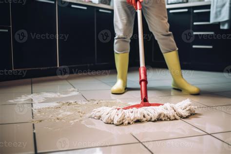 mopping the kitchen floor 22816482 Stock Photo at Vecteezy