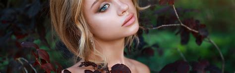 Download wallpaper leaves, girl, branches, face, portrait, Denis Lankin ...