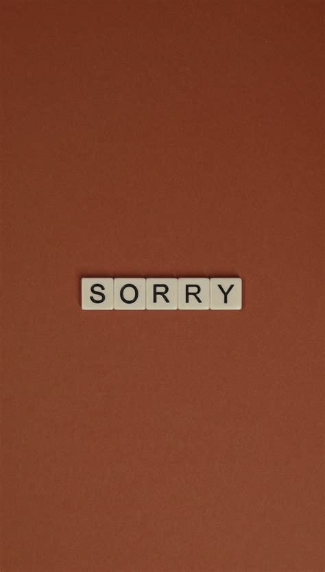 Download Im Sorry With Brown Background Wallpaper | Wallpapers.com