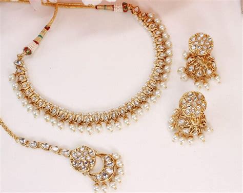 Tarinika Videni Antique Gold Plated Short Necklace & Drop Earring ...