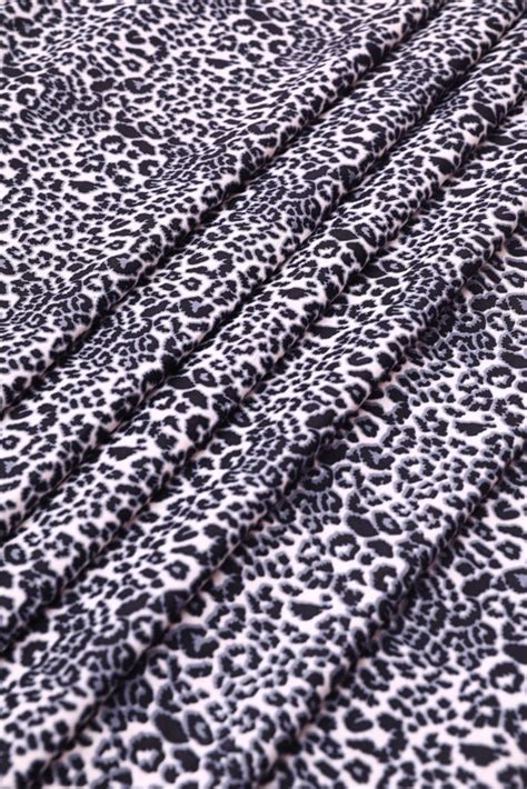 White and Blue Cheetah Printed Crepe Fabric – Fabrics Online 101