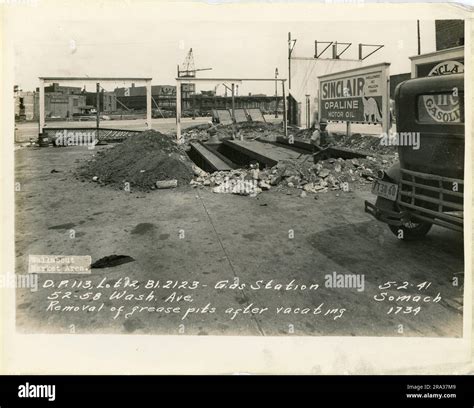 Photograph of exterior of lot 12, Bl. 2123, 52-58 Wash. Ave, gas ...