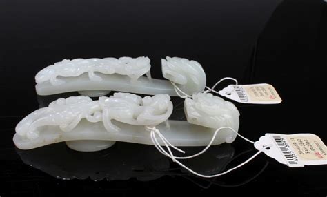 Sold Price: A Group of Two Antique Chinese Carved White Jade Belt Hook ...
