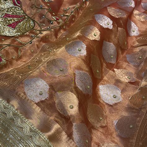 Narangi shade tissue silk dhup chao effect husn hand embroidered kadhw ...
