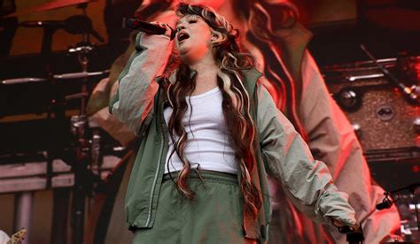 British singer Lola Young breaks silence following on-stage medical ...