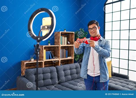 Down Syndrome Man Gamer Recording Video by Smartphone at Home Stock Photo - Image of disabled ...