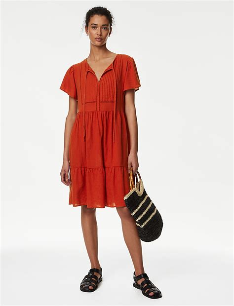 Buy Linen Blend Tie Neck Mini Tiered Dress at Marks & Spencer