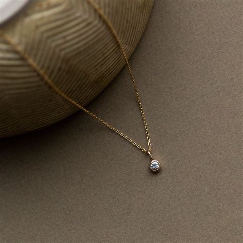 Claire Charm Pendant - White Moissanite - 9k – Handcrafted Cph