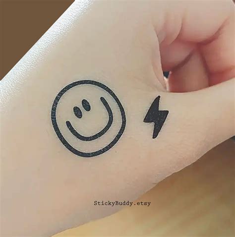 Watchmen Smiley Face Tattoo