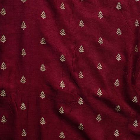 Banarasi Dola Silk Maroon With Light Gold Tiny Plant Motif Woven Fabri ...