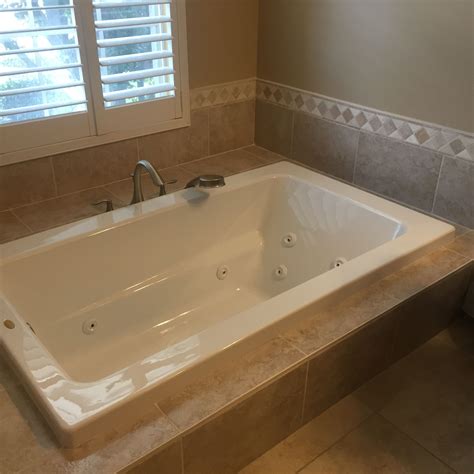 Drop-in jetted tub w/ MOEN Eva Roman tub spout & sprayer | Jacuzzi tub ...