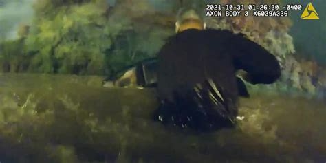 WATCH: Police rescue woman trapped in sinking car