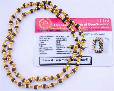Buy Apnisanskriti Black Tulsi Beads Mala in Golden Self Design Caps (63 ...