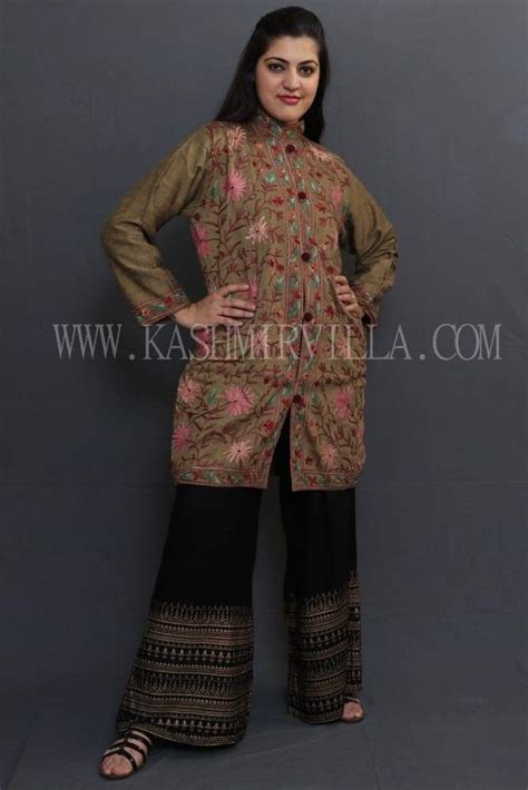 Mud colour embroidered jacket with beautiful aari jaal gives