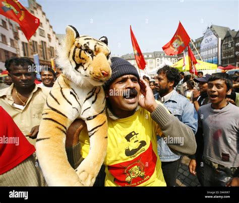Followers of the Liberation Tigers of Tamil Eelam (LTTE) demonstrate ...