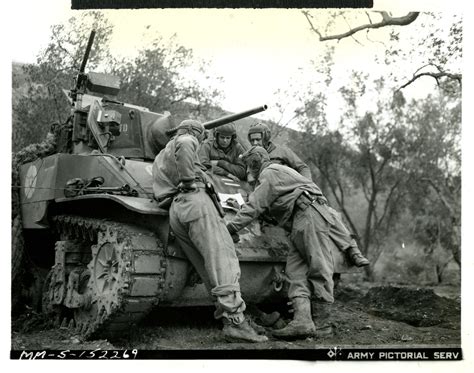Four US tank crew soldiers study a map, Italy, 1944 : r/WW2info