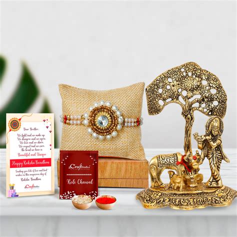 Designer Handcrafted Stone Pearl Rakhi with Lord Krishna playing Flute ...
