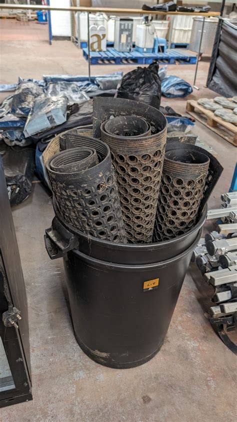 Quantity of large rubber floor mats plus 2 black binsPlease note, this ...