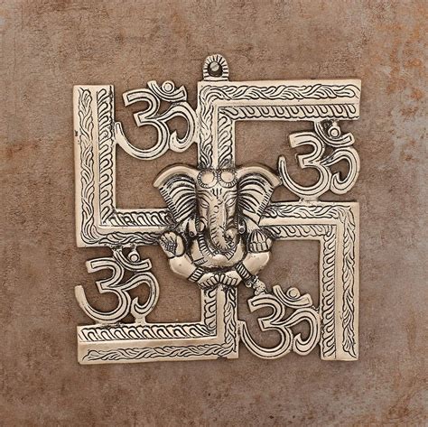 Buy eCraftIndia Lord Ganesha on Om Swastik Metal Silver Wall Hanging ...