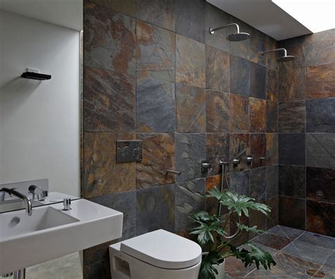 Slate tiles give this Cambridge bathroom a rustic connection to nature