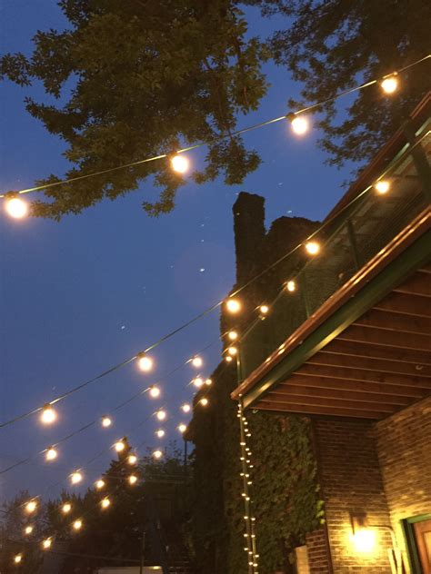 Outdoor cafe lights | Outdoor fairy lights, Cafe lights, Bistro lights ...