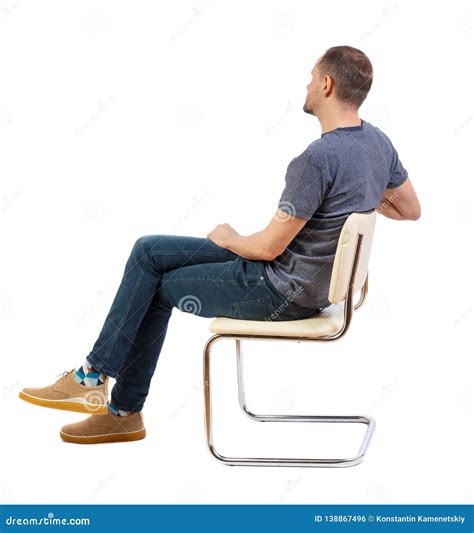 Side View of a Man Sitting on a Chair Stock Photo - Image of business ...