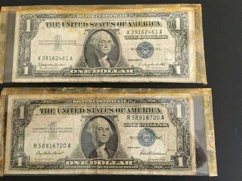 Two, 1957 $1 DOLLAR BILL SILVER CERTIFICATE BLUE SEAL one is series B ...