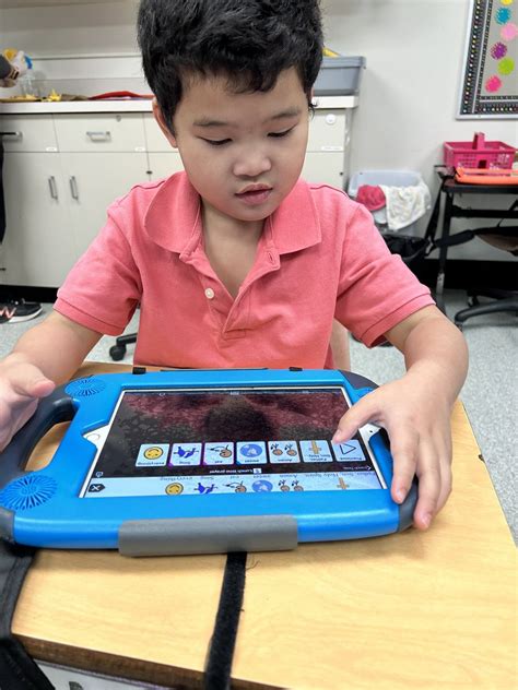 Image result for Child Using Proloquo2Go