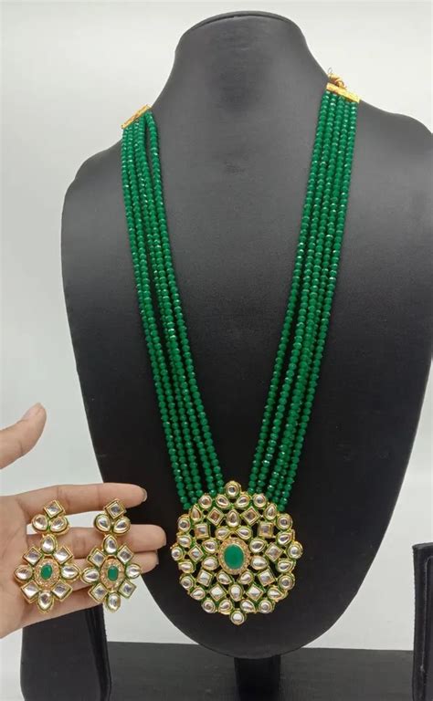 Heera jewellers Elegant Crystal Long mala with Pendant and pair earing ...