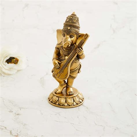 Tranquil Ganesha with Sitar Figurine | Gold | Polyresin