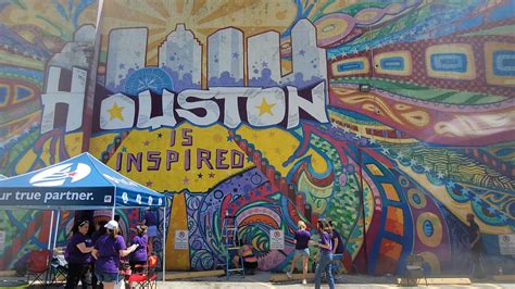 “Houston Is Inspired” mural given touch up after 10 years – Houston Public Media