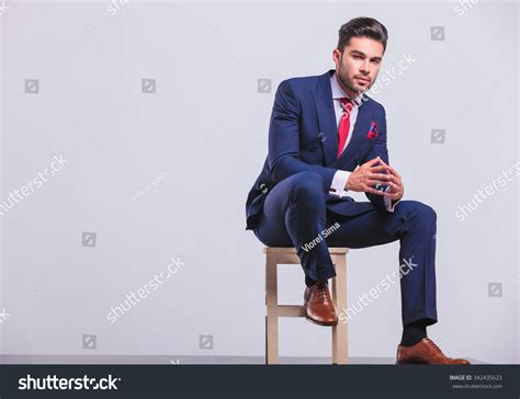 Suit Man Sitting 的图像结果
