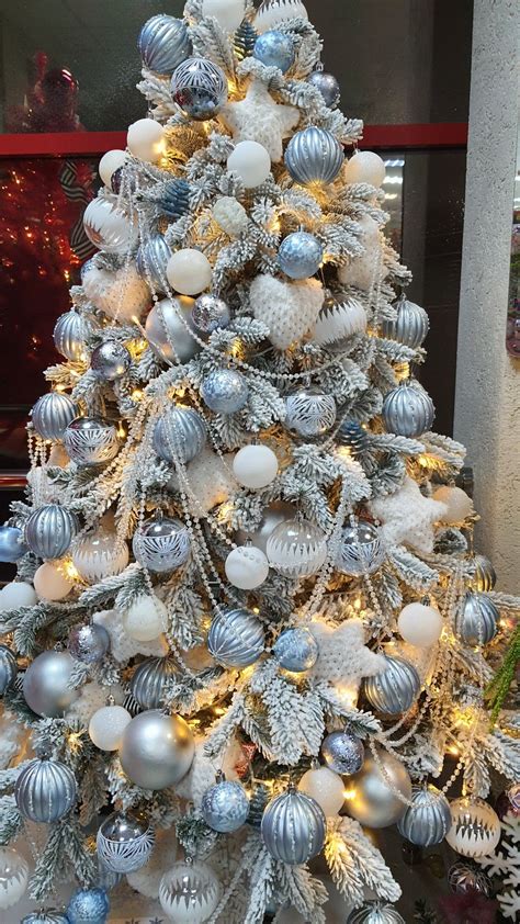 Silver and White Christmas Tree with Ornaments