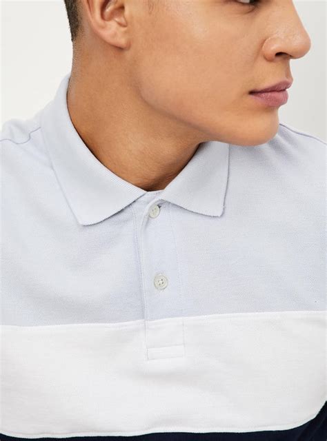 Buy Men Slim Fit Colourblocked Polo T-shirt Online at just Rs. 699.0 ...