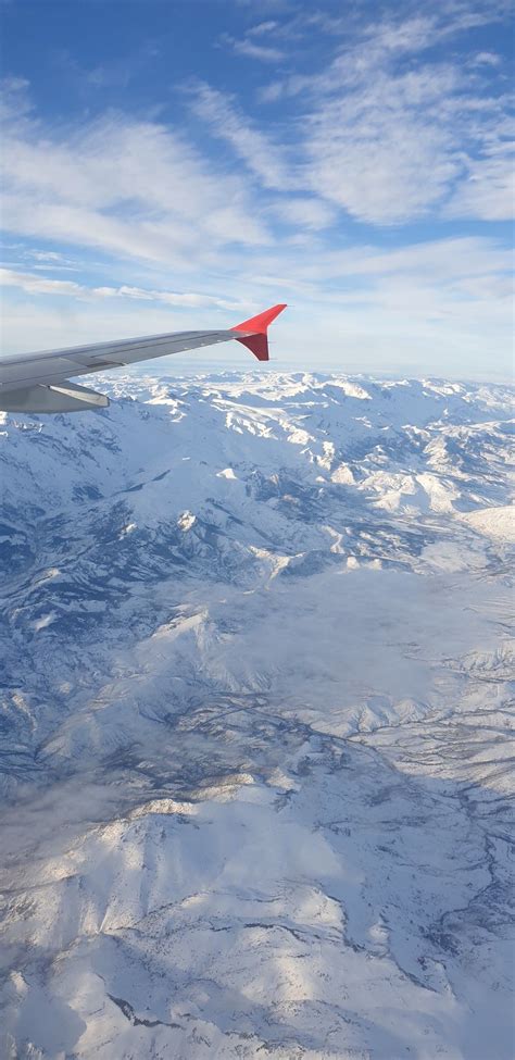 Image result for Plane Flying Over Snow