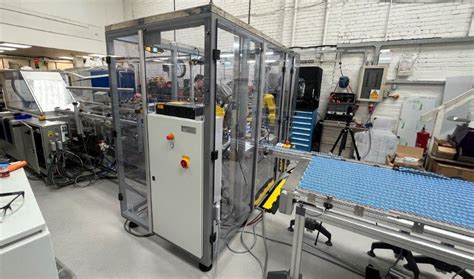 Image result for Robotic Tray-Loading