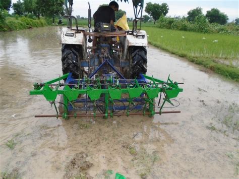 Grassroots Innovation Database [GRID] | Tractor operated paddy transplanter