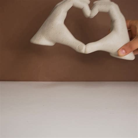 Love Heart Hands Resin Showpiece- Unique Showpiece Online | Nestasia