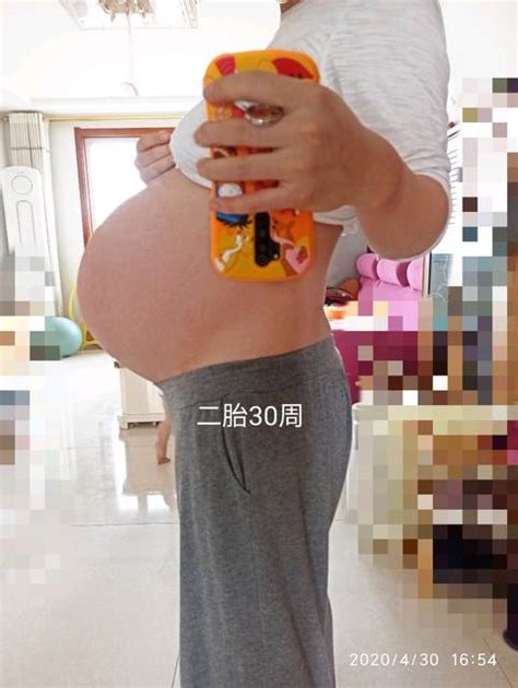 世界上最大肚子的孕妇，本以为怀了双胞胎，检查发现肚里有11个！