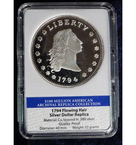 1794 Flowing Hair Silver Dollar Replica in holder. 100 Million American ...