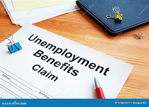 Unemployment Benefits Claim and Stack of Papers Stock Image - Image of ...
