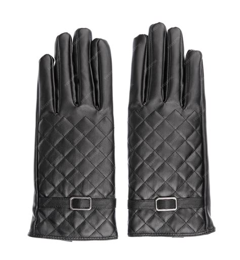 Premium Photo | Black winter leather gloves isolated on white background.