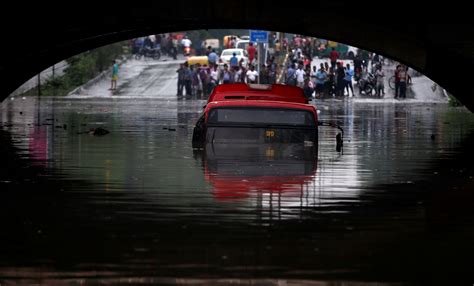 Delhi floods in photos: Evacuation begins as Yamuna level crosses ...